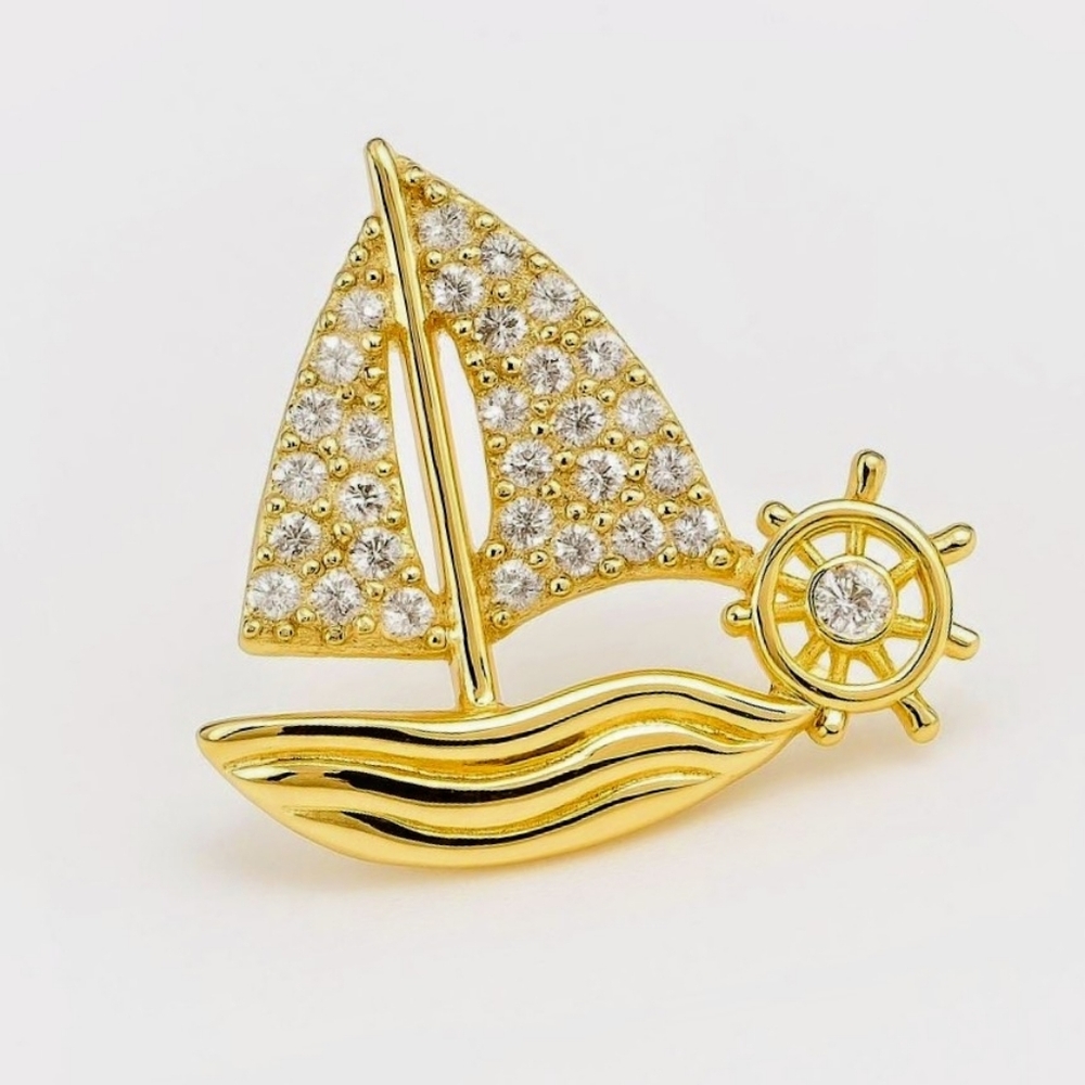 Sailboat broach with zirconias; approx 1" x 1"; nwot
